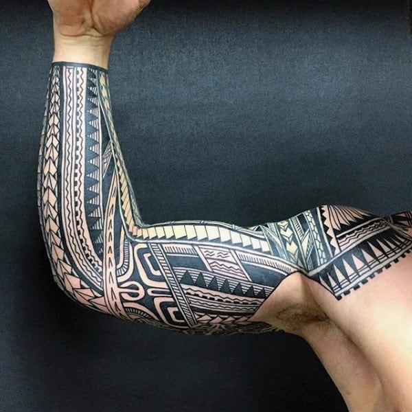 man-with-tribal-sleeve-tattoo