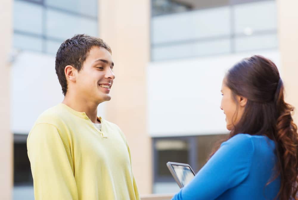 student-talking-to-classmate