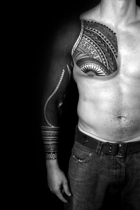 tribal-blackout-sleeve-tattoo-on-men